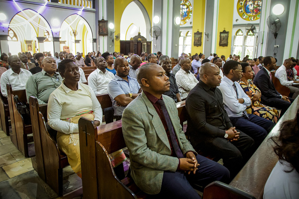Catholics gather for prayers during a special mass organized by the Catholic Archdiocese of Dar es Salaam to pray for victims of post-election violence following Tanzania's general elections at St. Joseph's Cathedral in Dar es Salaam on November 10, 2025. (Photo by AFP)