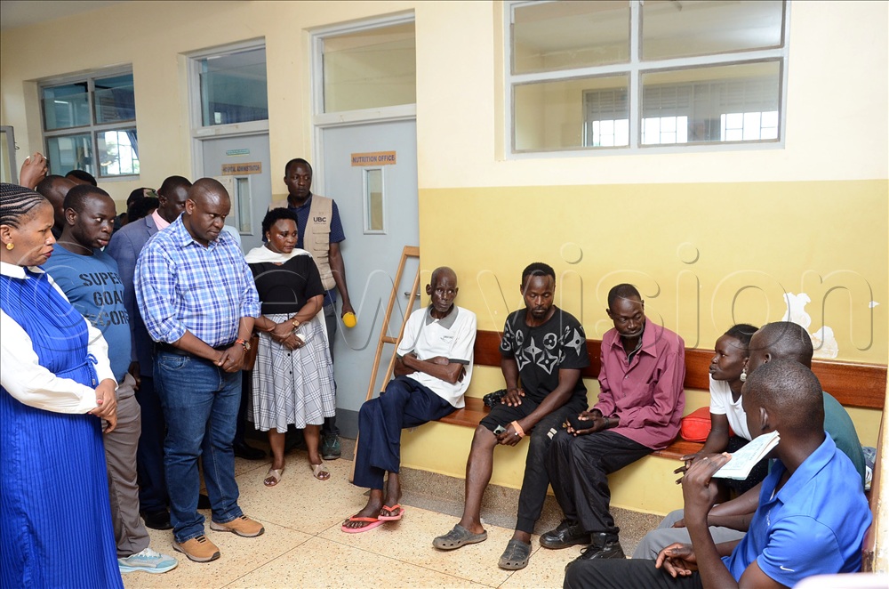  Hon. Balam Barugahara, Minister of State for Youth and Children Affairs and other officials interacting with the patients in line waiting for the x-ray services at Kiryandongo general hospital. This was during his Youth Wake Up Call tour to Kiryandongo district on September 17, 2025. 