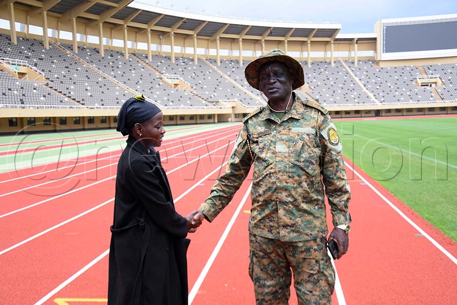 Halimah Nakaayi greets Kidemuka at Namboole Stadium 