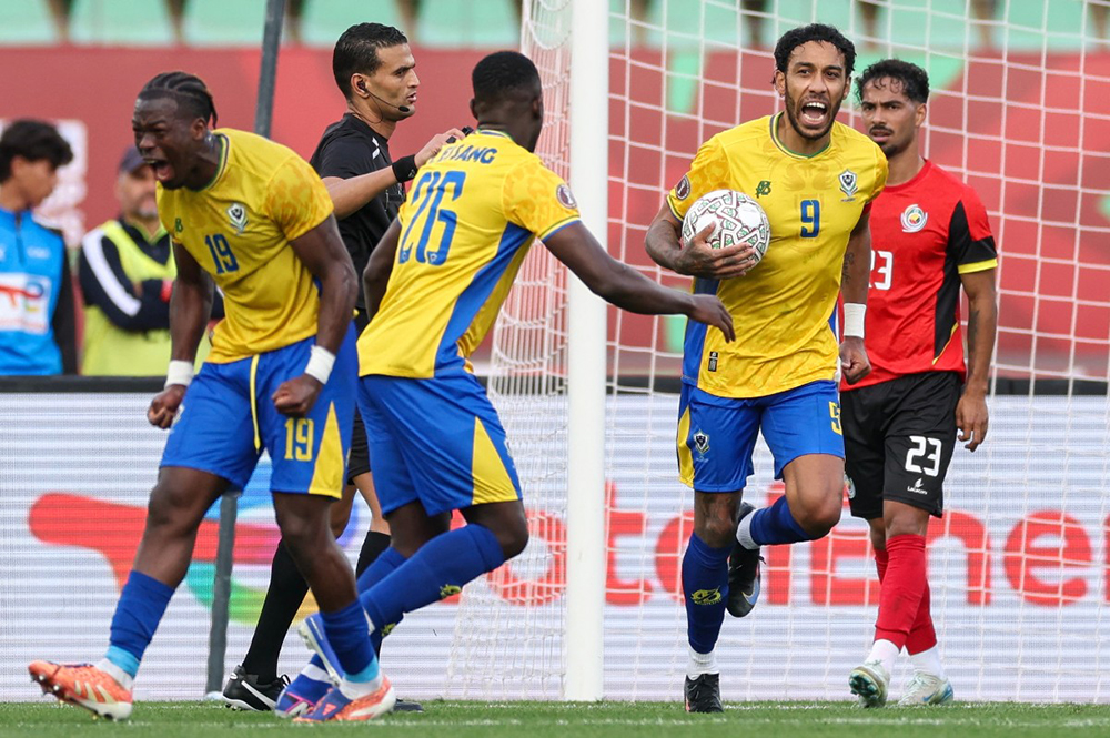 Gabon's defender #19 Jacques Ekomie and Gabon's forward #09 Pierre-Emerick Aubameyang celebrate a goal during the Africa Cup of Nations (CAN) Group F football match between Gabon and Mozambique at Grand Stadium in Agadir on December 28, 2025. 