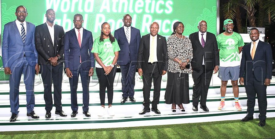 The NCS Chairman Ambrose Tashobya (left), Martin Mugarra Bahinduka, the Minister of Tourism, Wildlife and Antiquities Minister of State for Sports, Peter Ogwang (5th left) and Equator Hikes' Amos Wekesa (2nd right) and other stakeholders during the launch of the 5th Edition Rwenzori Marathon at Sheraton Gardens. Photo by Michael Nsubuga