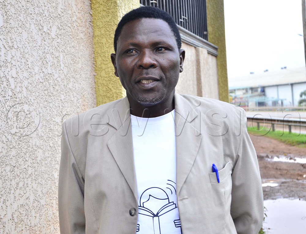 Kasozi Mutebi, Subdue Nations for Christ Church International senior pastor addressing journalists during an interview at Subdue Nations for Christ Church International in Naalya. (Photo by Juliet Kasirye)