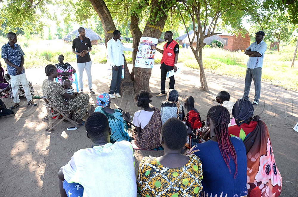 Residents of Ofua seven Uriama Subcounty in Rhino Camp Refugee Settlement in Terego district being sensitized about Ebola in a community meeting. This was on June 6, 2026. (Credit: Lawrence Mulondo)