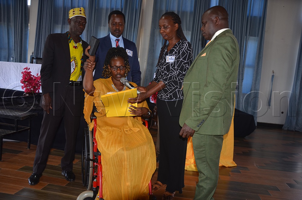 Sophie Kaseregenyi, the female councilor for PWD's, taking oath on Wednesday, May 13, 2026. (Credit: Wilson Asiimwe)