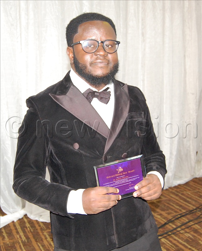 Andrew Ddembe, one of the receipients of SMACKOBA Rising Star Award displays his accolade