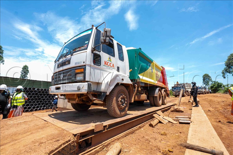 Some of the KCCA trucks at Buyala site. (Credit: Eddie Ssejjoba)