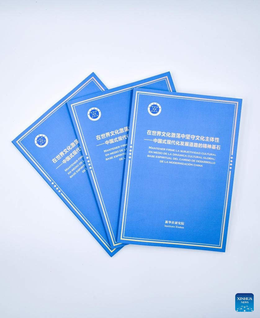 This photo shows copies of a think tank report titled "Upholding Cultural Subjectivity Amid the Dynamic Interplay of World Cultures: The Spiritual Cornerstone of China's Path to Modernization." The "Hongting Forum: Meeting of Civilizations between China and Mexico" was held in Mexico City, capital of Mexico, on Friday. Xinhua News Agency released the report during the forum.
