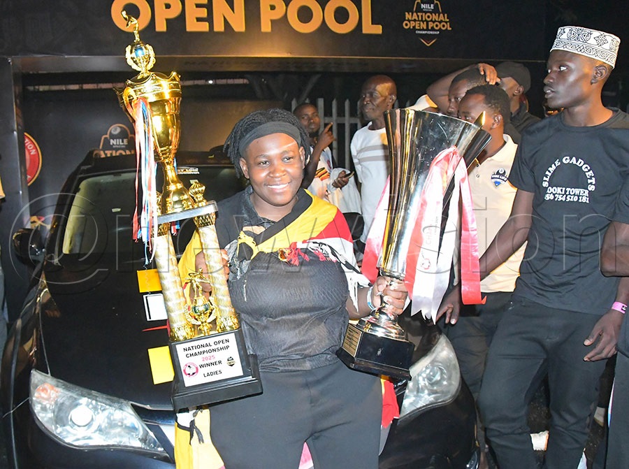 Rashida Mutesi celebrates with the trophies and the car she won in the 2025 National Pool Open. Photo: Silvano Kibuuka