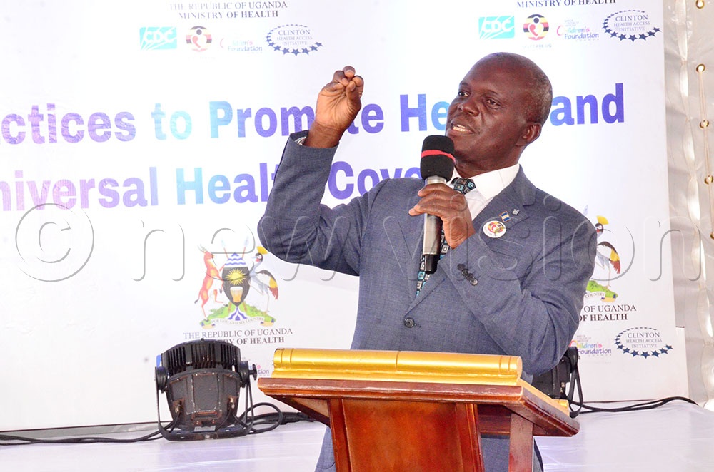 Associate Professor at Makerere School of Public Health Dr Fredrick Makumbi addressing guests during the launch of the digital Self Care App. (Credit: Agnes Kyotalengerire)