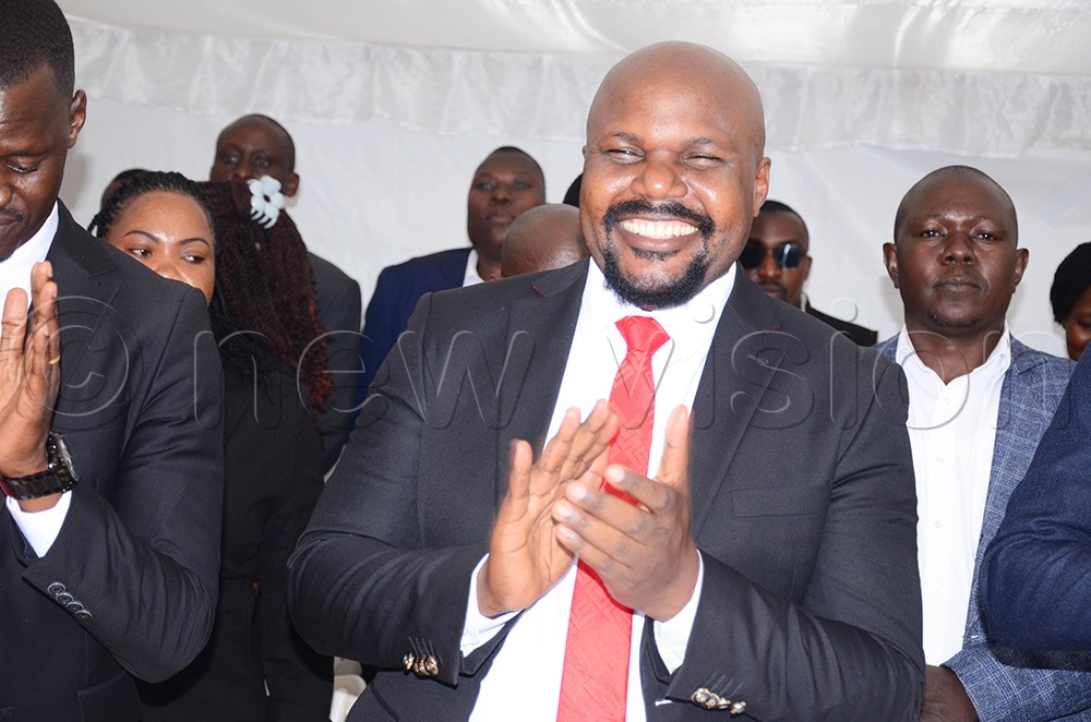 Common Man's Party (CMP) party president, Mubarak Munyagwa expressing his excitment shortly after swearing in at Jacaranda Gardens in Rubaga division on Tuesday. (Photo by Isaac Nuwagaba)