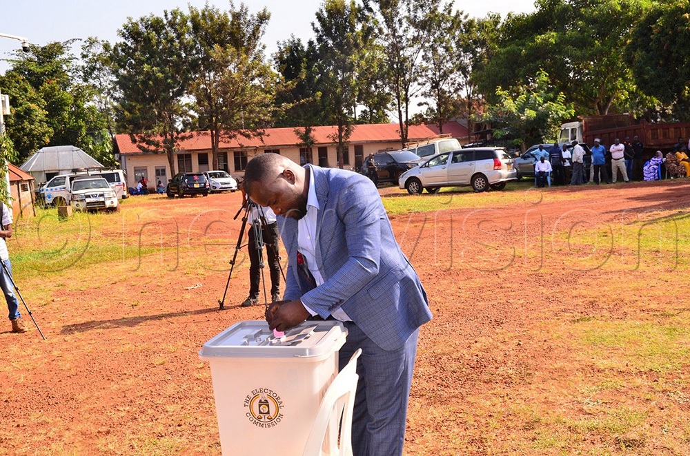 Samuel Mukopi while casting his vote for the speakership of the Jinja City Northern Division Council, where he tied with his rival at the Bugembe division offices on Friday, July 3, 2026. (Photo by Jackie Nambogga)