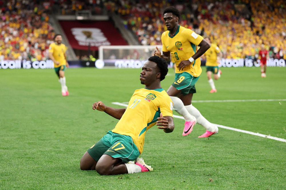 Nestory Irankunda #17 of Australia celebrates scoring his team's first goal during the FIFA World Cup 2026 Group D match between Australia and Türkiye at BC Place Vancouver on June 13, 2026 in Vancouver, British Columbia. (Photo by Stu Forster/Getty Images/AFP)