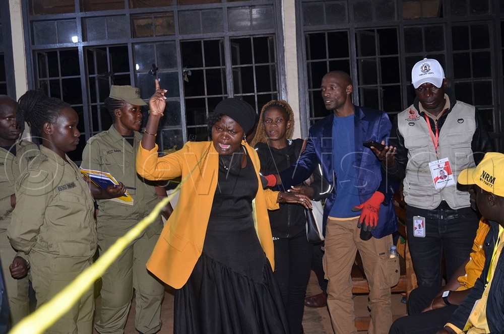 A crying Peace Tibyaze said it was inevitable and doesn&rsquo;t regret her act because she was on the right track, which earned her the flag until she fought her way to parliament. (Photo by Jackie Nambogga)