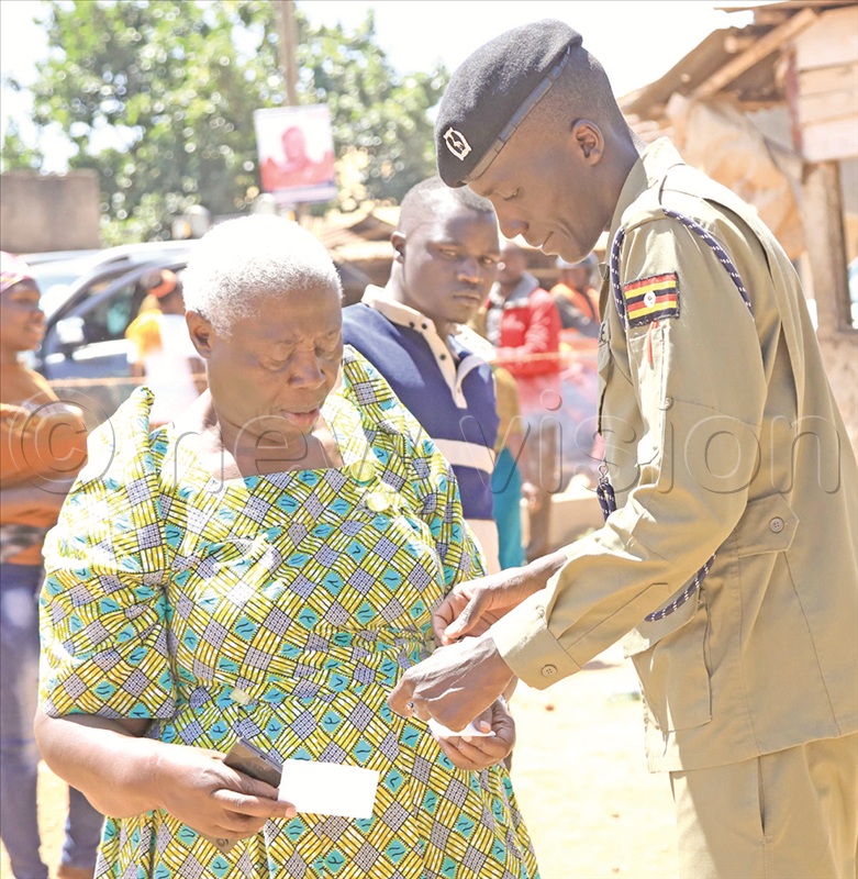 Lt. Gen. Proscovia Nalweyiso, the presidential advisor on security,  arriving to cast her vote in Ntaawo cell, Mukono district.