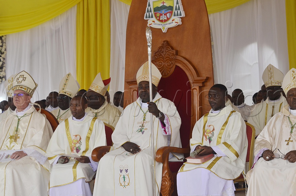 The newly ordained Bishop of Kabale Catholic Diocese, Bonaventure Bosco Katusiime Gubazire, with other bishops on Saturday, October 3, 2026. (Photo by Juliet Anna Lukwago)