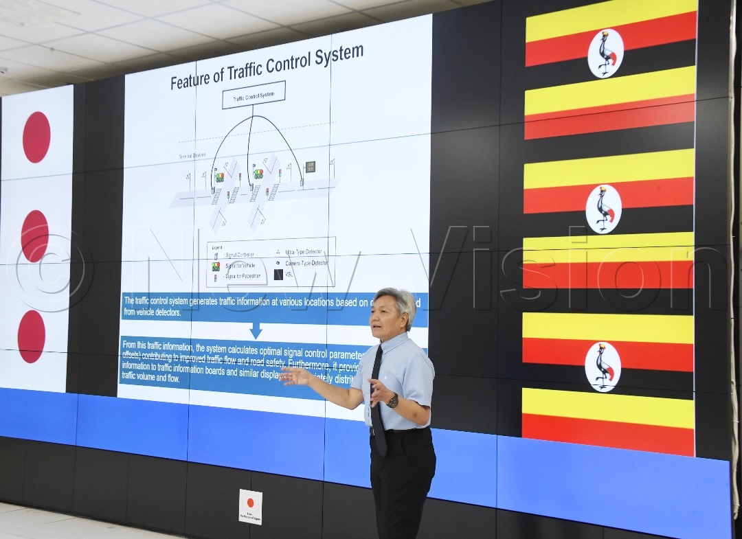 Tetsuro Izawa, Project Manager, Road Planning Dept. Road Transport Division, Oriental Consults Global, explaining the traffic control system. (Credit: Mpalanyi Ssentongo)