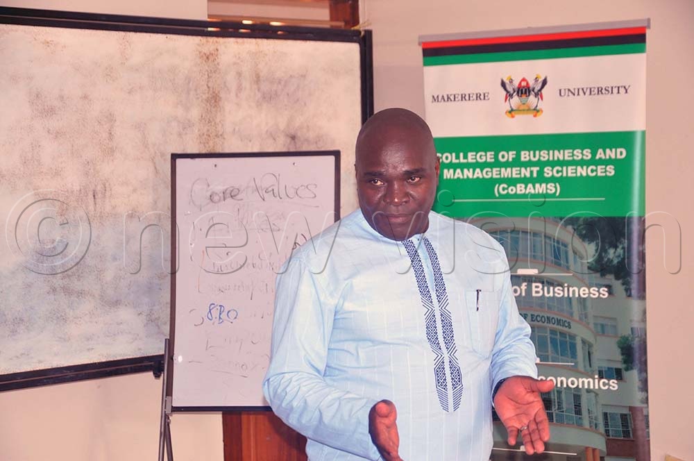 Sseruyange facilitating the training for District Local Government officials under the theme: ‘Environmental Valuation, Evaluation, Accounting and Climate Change Mitigation and Adaptation in Uganda’. It is being held at the Central Inn Hotel in Entebbe. (Credit: John Odyek)