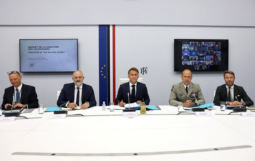(From L) Presidential advisor Emmanuel Bonne, The Elysee Palace’s secretary-general Pierre-Andre Imbert and France's President Emmanuel Macron, Chief of Staff to France's President, General Vincent Giraud and Strategic Affairs and Disarmament Adviser to the President Xavier Chatel take part in a video-conference meeting of the Coalition of the Willing summit in Paris, on August 24, 2026. (Photo by Stephanie Lecocq / POOL / AFP)