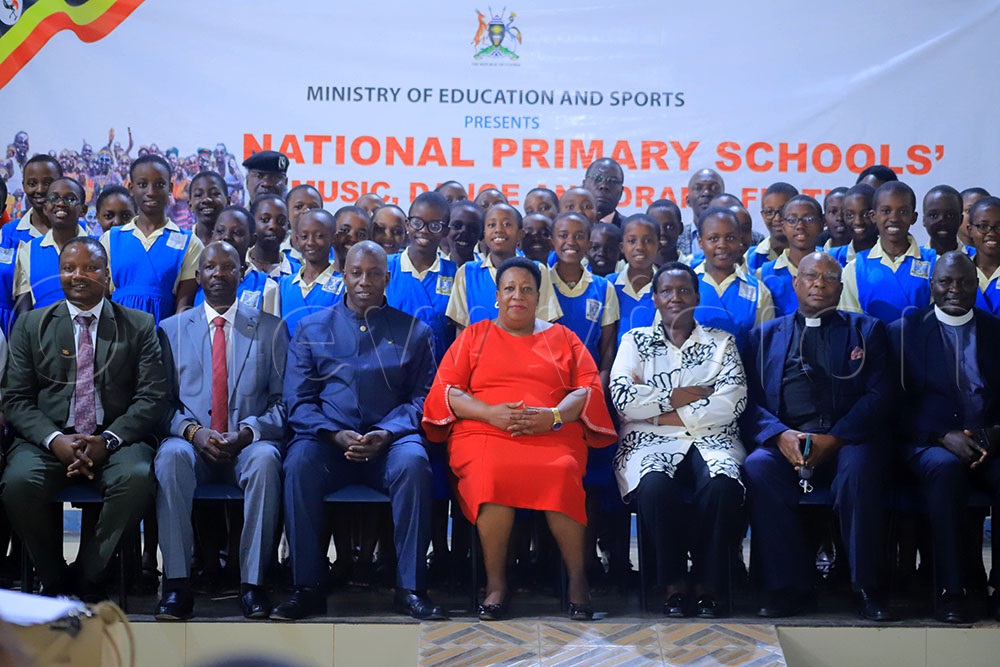 From right: Ankole diocese Rev Canon Edson Abasa, Dean St.James Cathedral Rev Canon Bobs Mwesigye, Mbarara City RCC Catherine Kamwine, Francis Atima, the Director of Directorate of Education Standards, Mbarara High School head teacher Ham Ahimbisibwe and other officials and pupils posing for the photo shortly after opening the MDD Festival. (Photo by Abdulkarim Ssengendo)