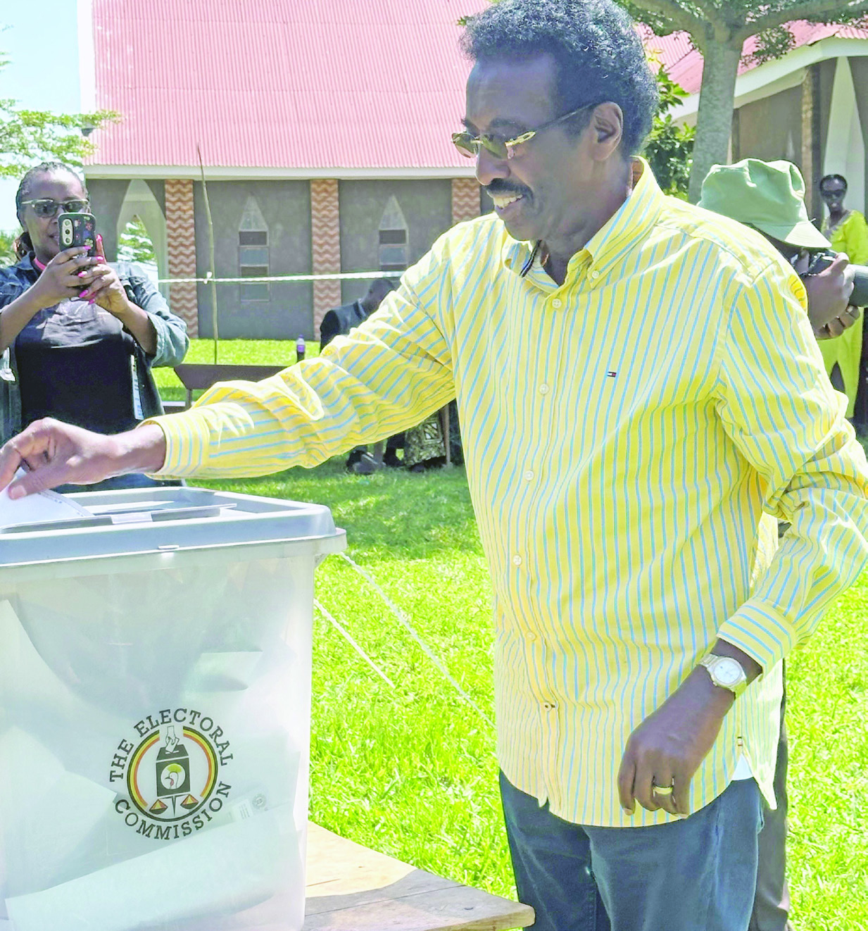 Security minister Jim Muhwezi voting at Buchenche Church in  Kigaga parish in Rukungiri district. He won in Rujumbura County.