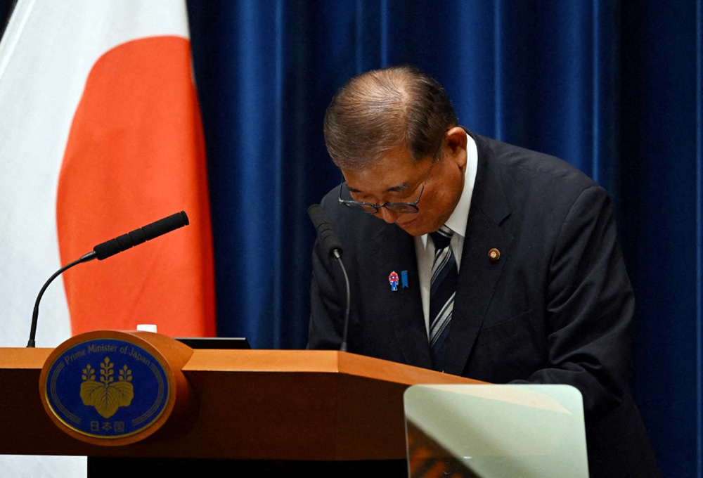 Japanese Prime Minister Shigeru ISHIBA bows his head during a press conference at his office in Tokyo, Japan, on September 7, 2025, announcing that he has decided to resign from his post. (Photo by Taketo OISHI / The Yomiuri Shimbun via AFP)