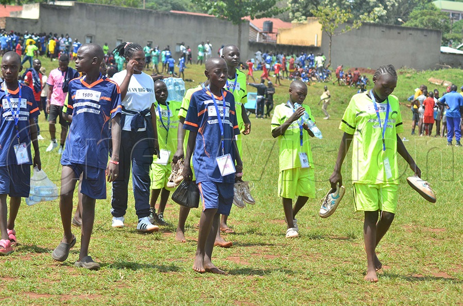 Primary school children being verified a head of the compitition Esiku