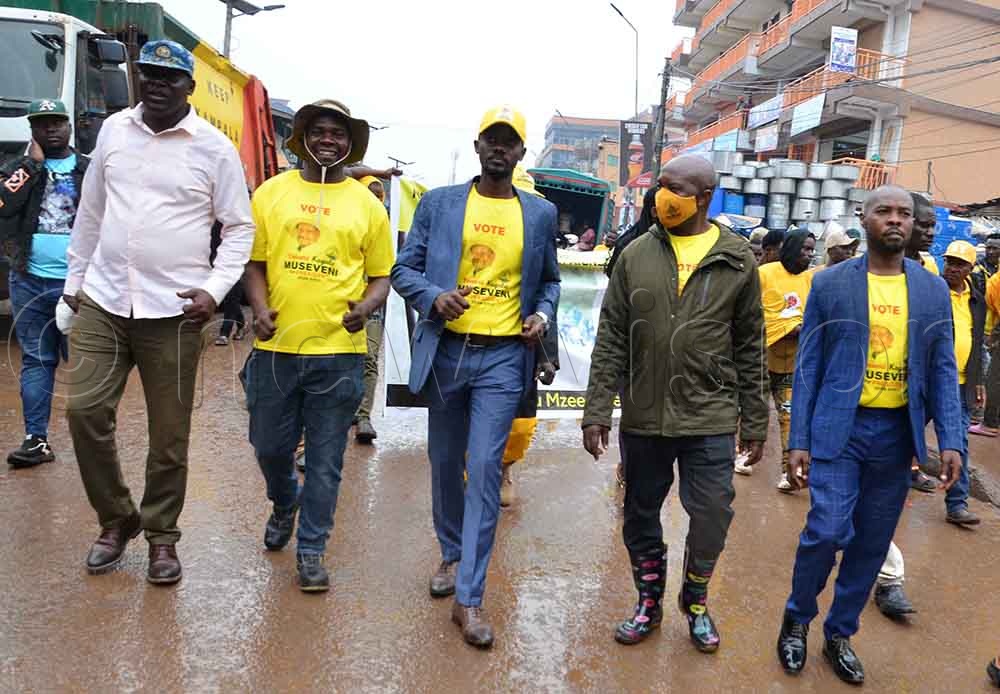 Juma Tinyefunza (Centre) with other members of the NRM Youth High Command, during a door-to-door campaign drive on Sunday, December 28, 2025. (Credit: Stuart Yiga)