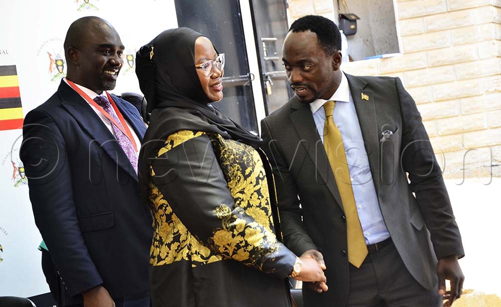 Hajjat Sharifah Buzeki, KCCA Executive Director interacts with Abu Mwesigwa, President of the Republic of Uganda photographer during a press conference at Uganda Media Centre, in Kampala on 6th May 2026. (Credit: Juliet Kasirye)