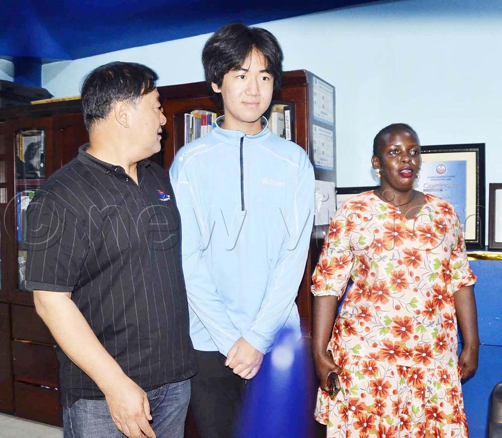 Director Eric Wang Foundation Eric Wang, Patron David Wang and administrator Dorah Nakirya addressing the press conference at Simbaland Cargo Holdings offices, Ham Building. (Credit: Isaac Nuwagaba)