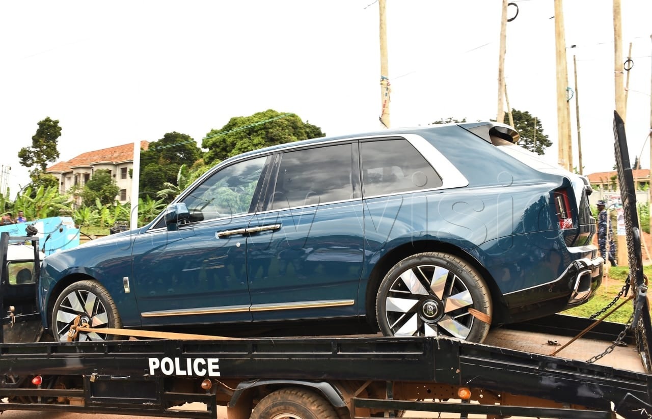 The Rolls-Royce and Range Rovers were loaded onto a Police car carrier and reportedly exhibited by Police. (All Photos by Ignatius Kamya)