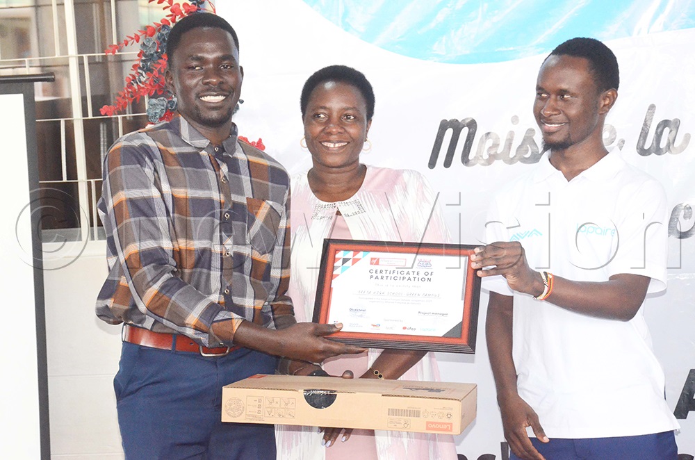 Seeta High School Green Campus student Kevin Akampwera won a laptop computer to continue studying French in school. (Photo by Isaac Nuwagaba)