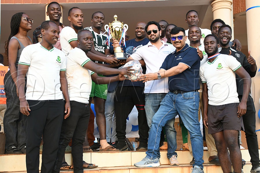 The National Drug Authority members pose with their trophy at the St. Lawrence University campus. Photo by Michael Nsubuga