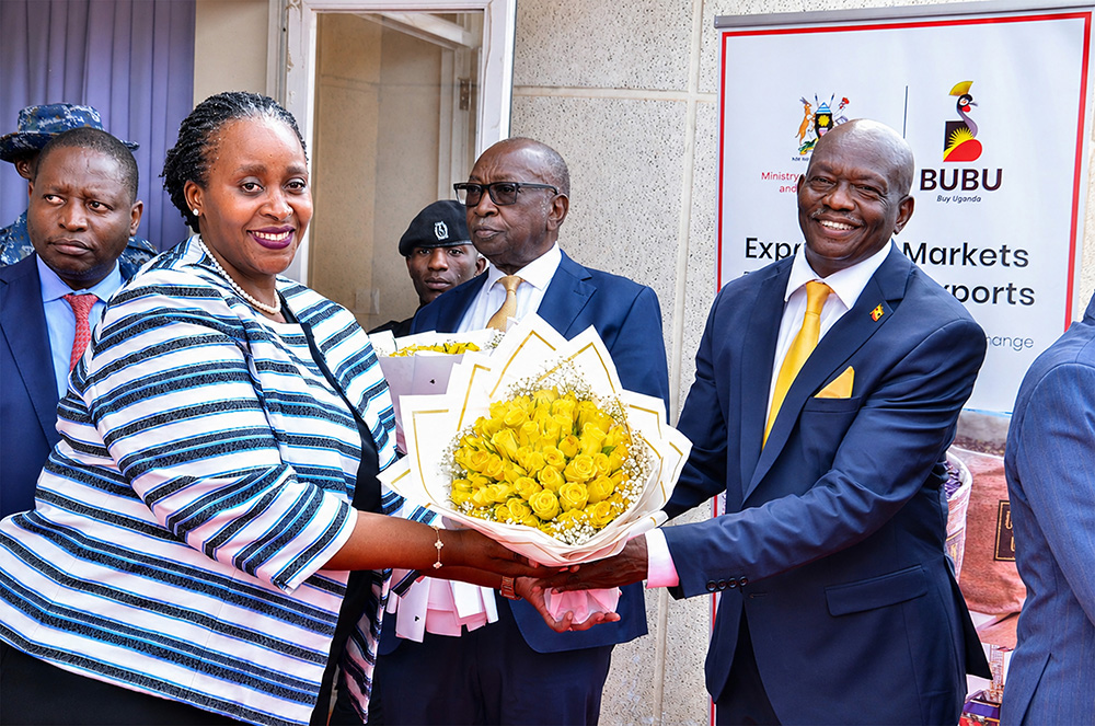 Alero Tom Aza, incoming Minister of State for Cooperatives (R) being welcomed at the ministry by Permanent Secretary, Lynette Bagonza. (Courtesy photo)