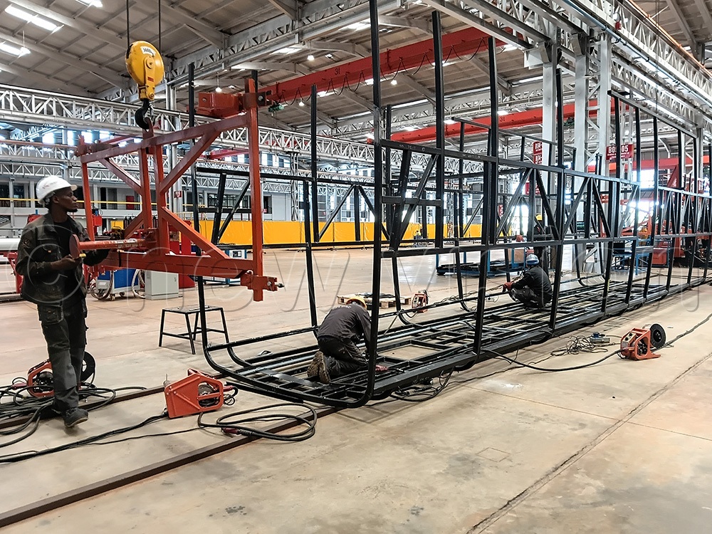 Workers assembling the bus frames at Kiira Motors Corporation (KMC) in Jinja. (Photo by Doreen Musingo)
