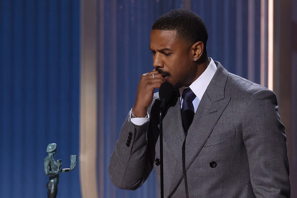US actor Michael B. Jordan accepts the award for Outstanding Performance by a Male Actor in a Leading Role in a Motion Picture for "Sinners" during the 32nd Annual Actor Awards at the Shrine Auditorium in Los Angeles on March 1, 2026. 