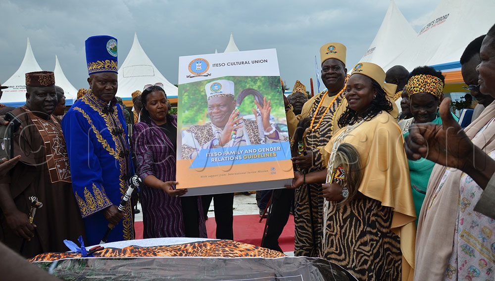 From left Obara, Mudoma, Kimani and Emolot display a copy launched book. (Credit: Faustine Odeke)