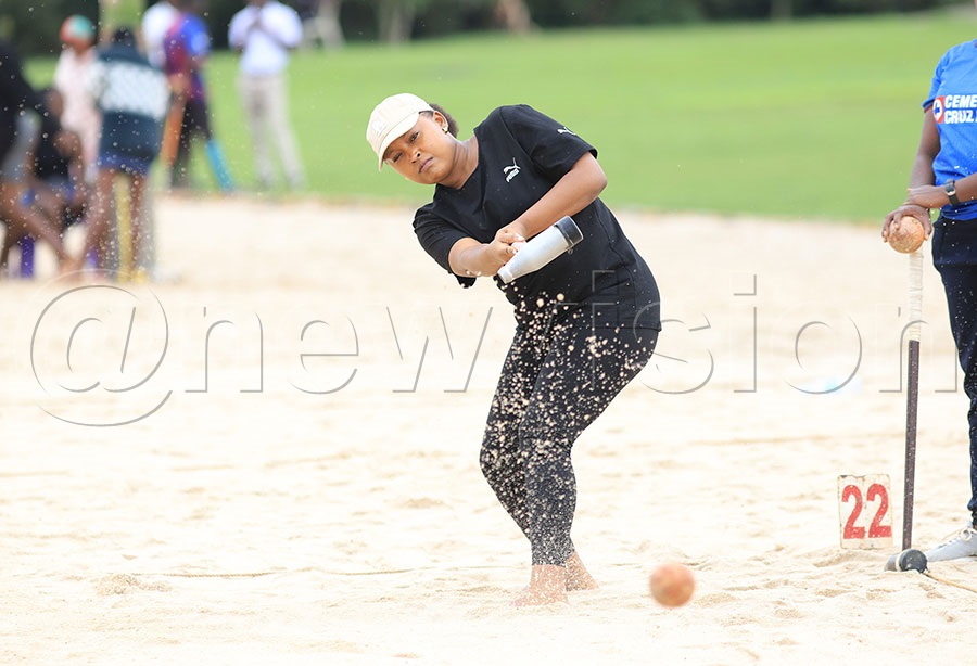 A female woodball Player during the National Beach Woodball Tournament in Bunjako
