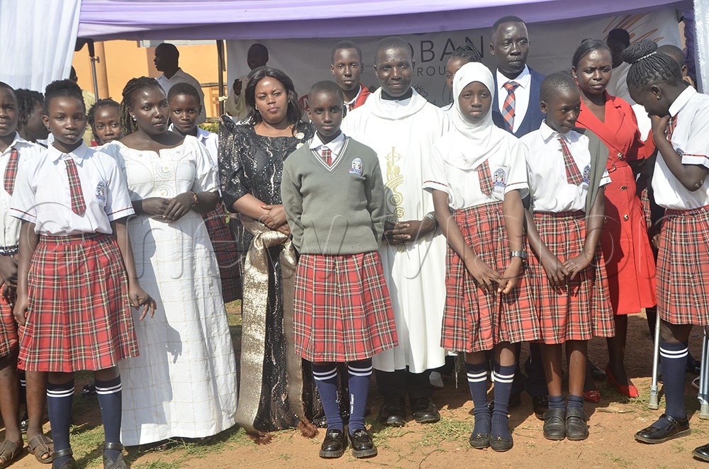The school director (Prossy Ssekadde) promised to keep the legacy of her deceased husband, saying: “As the new director of the school, I urge parents to support us with my teachers to ensure that the mission and objectives of the founder of this school thrive despite his demise.” (Credit: Nicholas Kajoba)
