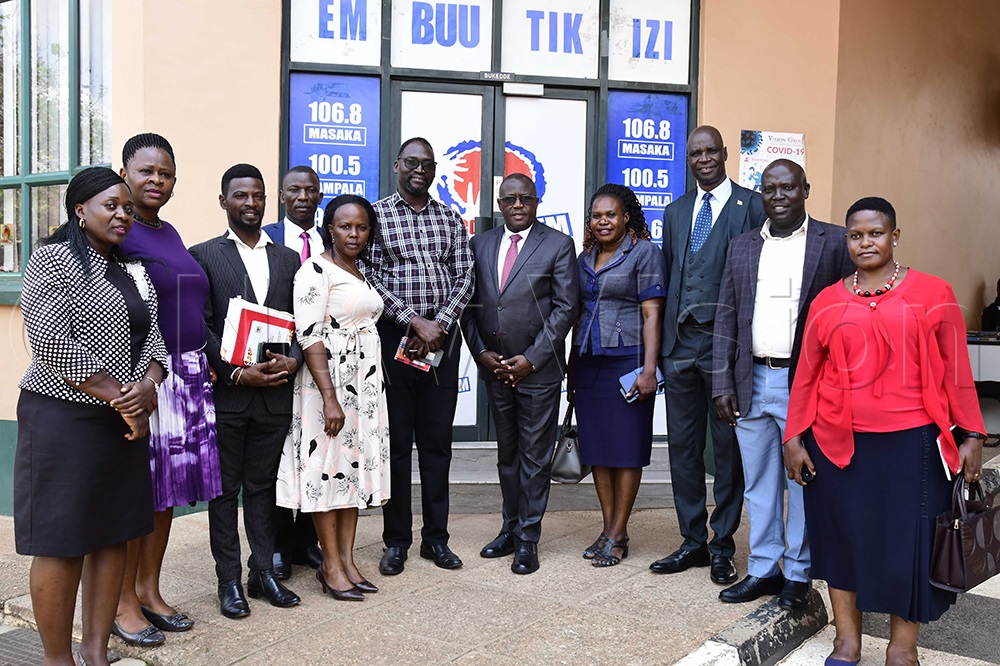 Leaders from Wakiso district led by the LC5 chairman, Matia Lwanga Bwanika (C) and CAO, Alfred Malinga (3rd right) Tuesday paid a visit to the New Vision head and interacted with some editors. 6th left is Miria Sydney, Content Manager special projects and Francis Kagolo, Senior Producer, News and Current Affairs. (Photo by Eddie Ssejjoba)