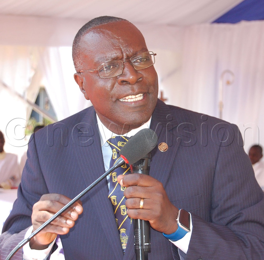 The Vice-Chairman of the PTA of SMACK, Dr Medard Bitekyerezo, delivers his remarks during the celebration of the school's feast day at the school on Entebbe Road, Wakiso District, on Monday, August 17, 2026. (Photo by Mathias Mazinga)
