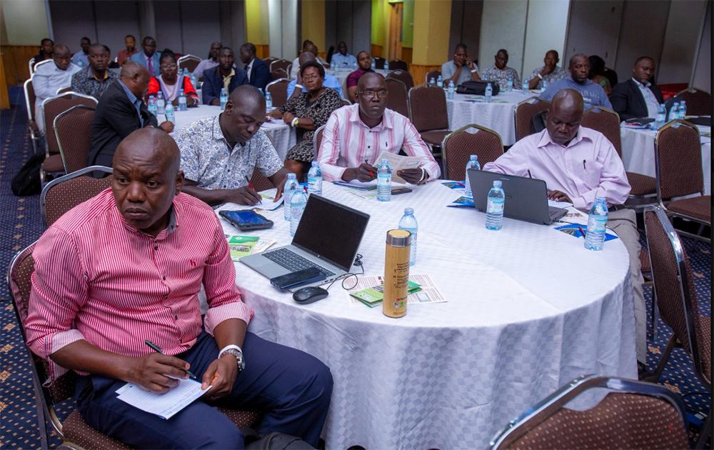 Participants listen keenly during one of the sessions at the Uganda National Agricultural Extension Week in Kampala. (Courtesy)