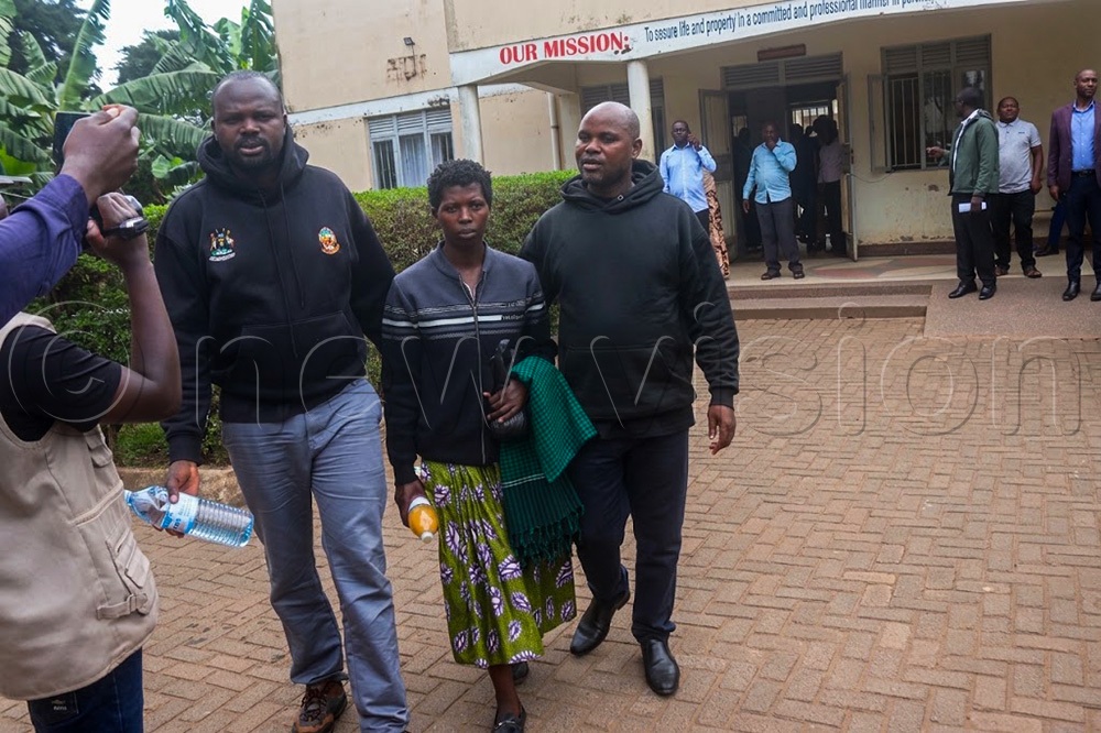 Kisoro District Speaker Amos Hakizimana, John Muftimukiza and Joseline Nyirambabazi at Kisoro Police Station. (Photo by Nelson Ahimbisibwe)