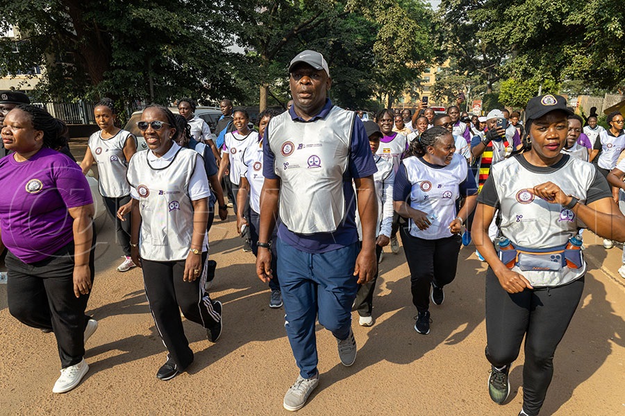 L-R Lady Justice Olive Kazaarwe Mukwaya, Justice Michael Chibita and Lady Justice Flavia Nabakooza at the helm of a judicial officer’s procession commemorating the inaugural the international day for Judicial well-being. Photo by Richard Sanya 