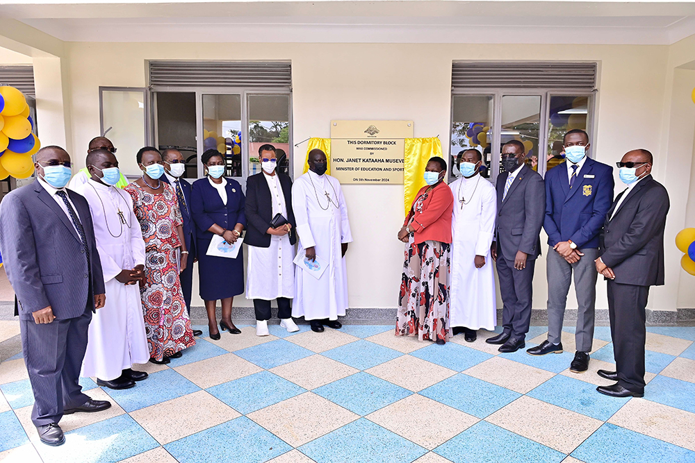 First Lady and Minister of Education and Sports, Mrs Janet K. Museveni, stands alongside school officials, clergy, and government representatives during the commissioning of a new dormitory block at St. Mary’s College Kisubi. (PPU photo)