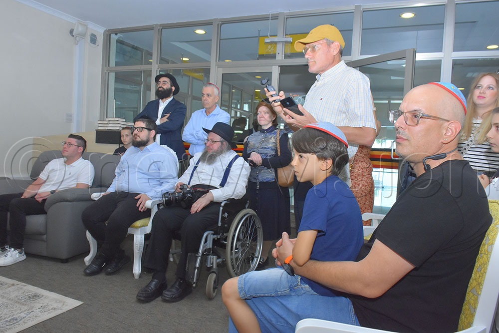 Some of the Jews who turned up at Entebbe airport, listening to the emotional story of Gilbert Weill who was among the hostages of Air France in 1976. (Credit: Julius Luwemba)