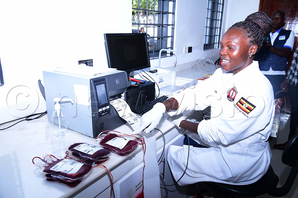 Suzan Acakara, the laboratory officer screening blood in the newly launched blood bank in Soroti. (Photo by Godfrey Ojore)