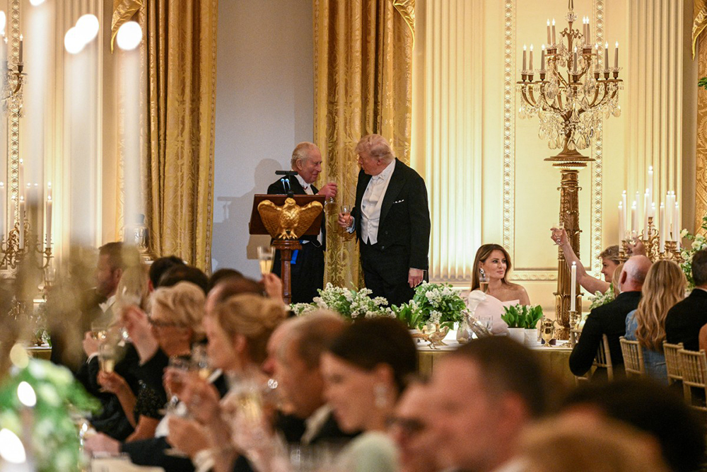 Britain's King Charles III and US President Donald Trump share a toast during a State Dinner in the East Room of the White House in Washington, DC, on April 28, 2026. (AFP)