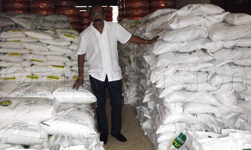 Meerasa Saleem, the Executive Director of Uganda Social Educational Welfare Association displaying essential items donated to orphans and Mosques. (Credit: Fred Mubanda)