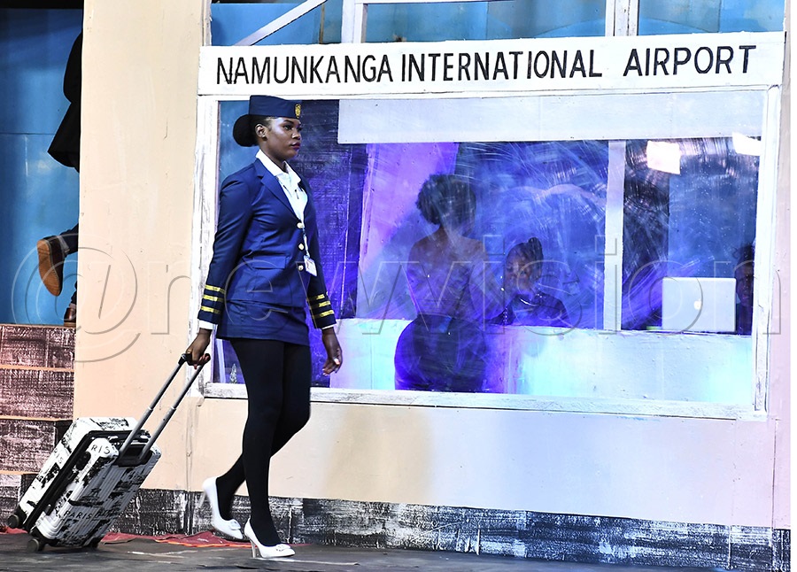A flight attendant after getting off the plane during Namunkanga play at Bat Valley Theatre. Photo by Ignatius Kamya
