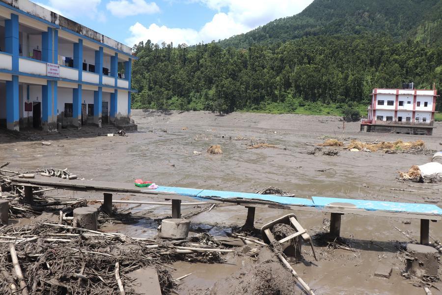 This photo taken on Aug. 26, 2026 shows damaged buildings after flash floods in Nuwakot District, Nepal. (RSS via Xinhua)